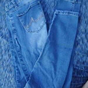 Classic Blue Skinny Jeans with Distressed Detailing
